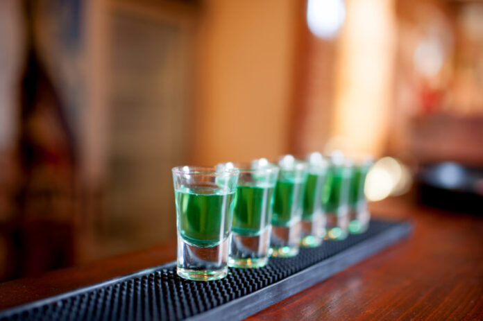 alcoholic shots of different drinks at a party in a nightclub on